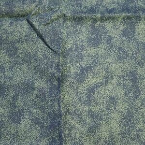 green darker green patchy fabric